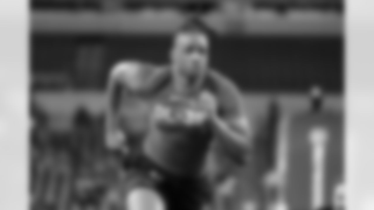 Missouri defensive lineman Isaiah McGuire runs a drill at the NFL football scouting combine in Indianapolis, Thursday, March 2, 2023. (AP Photo/Michael Conroy)