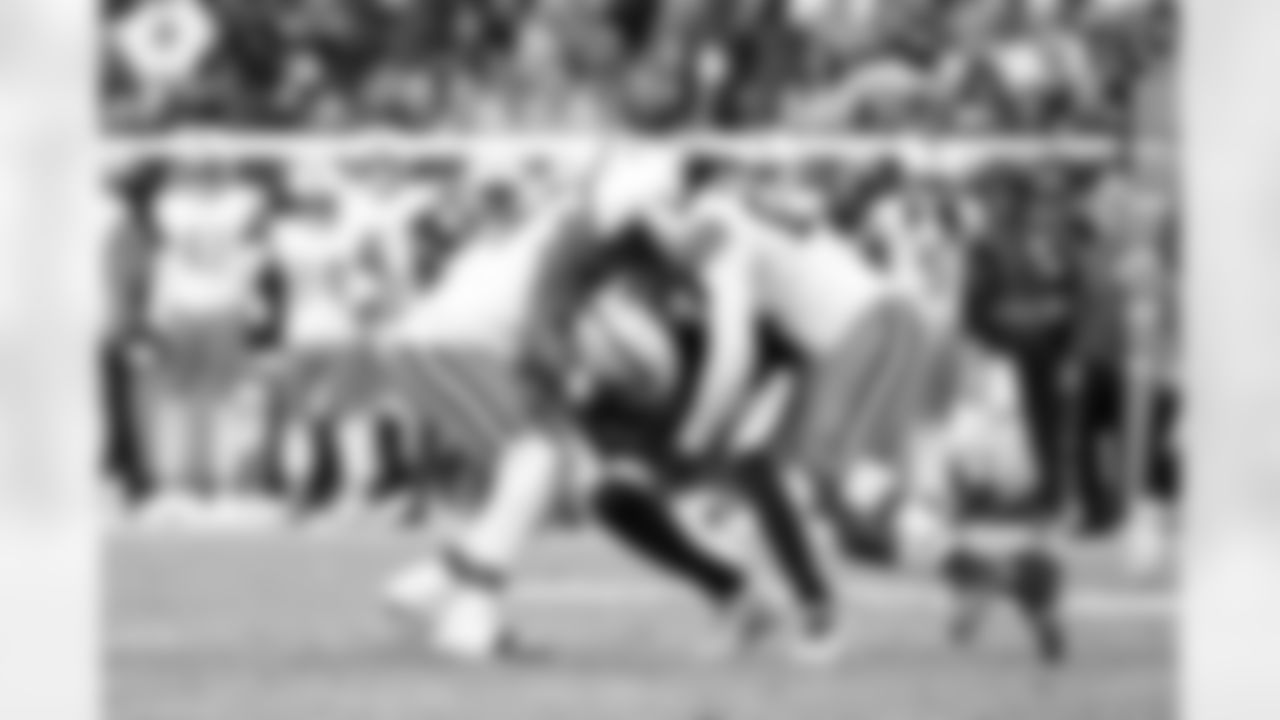 Defensive tackle Mike Hall Jr. (51) and Defensive end Isaiah McGuire (57) during a NFL football game between the Cleveland Browns and Las Vegas Raiders on November 23, 2025 at Allegiant Stadium.