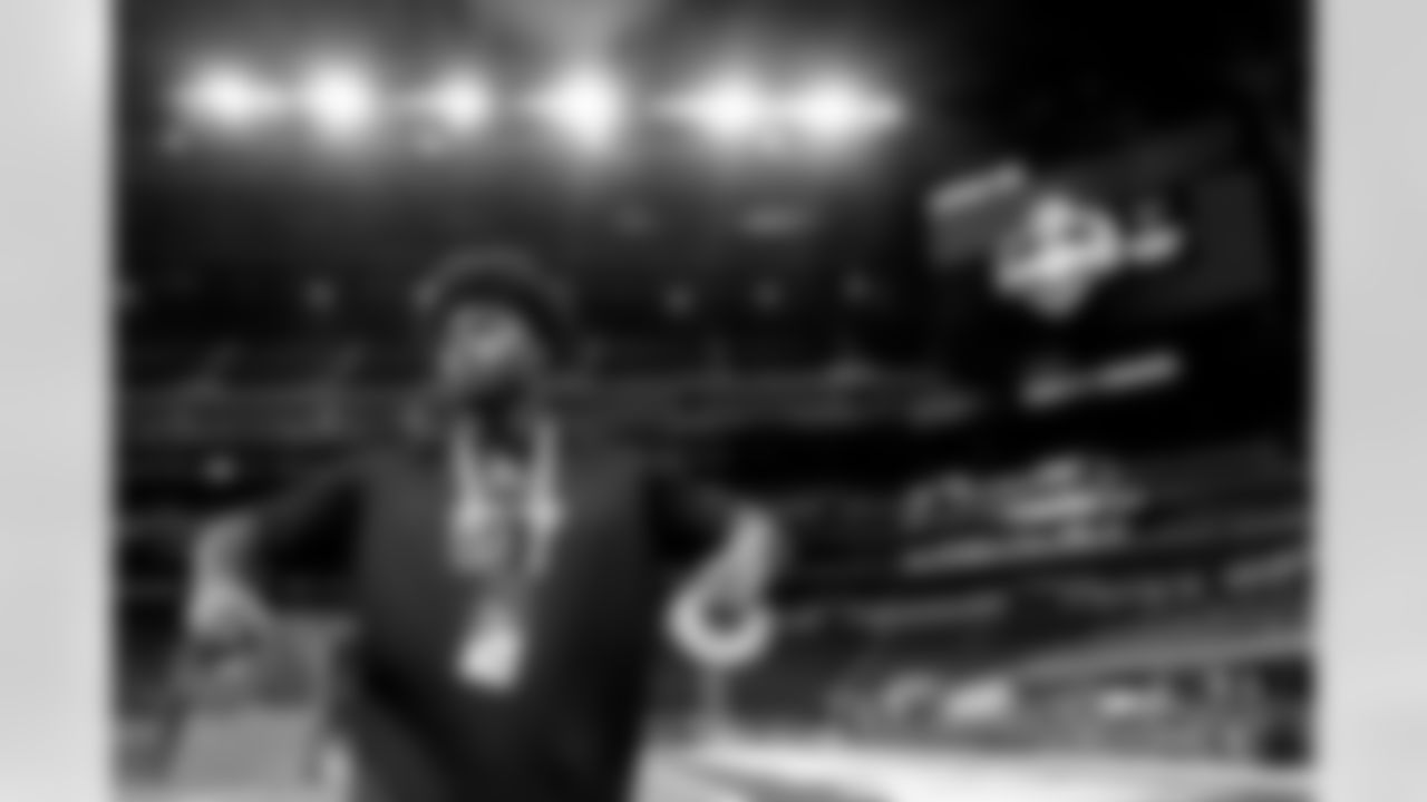 Bowling Green tight end Harold Fannin Jr. stretches at the NFL football scouting combine, Saturday, March 1, 2025, in Indianapolis. (AP Photo/Charlie Riedel)