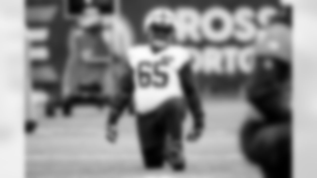 Offensive guard Germain Ifedi (65) during practice at CrossCountry Mortgage Campus on December 11, 2024.