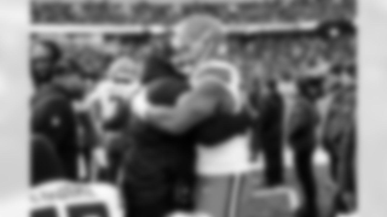 Defensive Line Coach Jacques Cesaire and Defensive end Myles Garrett (95) during a NFL football game between the Cleveland Browns and Cincinnati Bengals on January 4, 2026 at Paycor Stadium. The Browns won 20-18.
