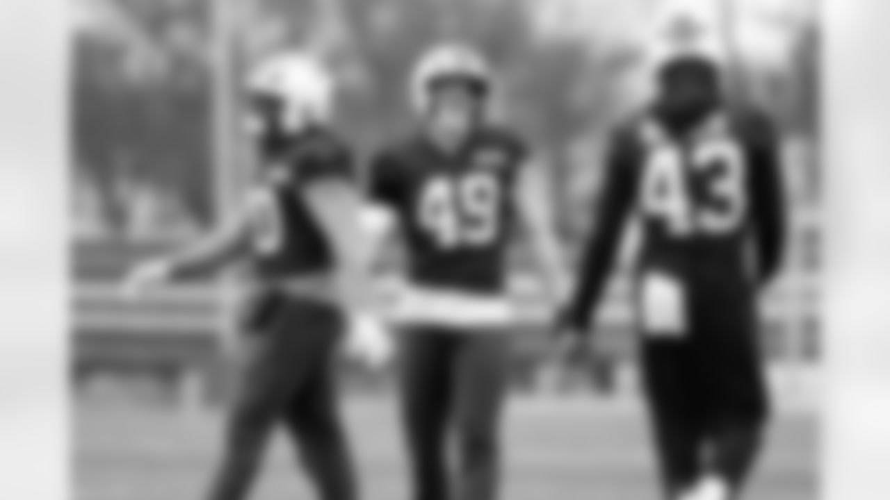 Linebacker Devin Bush (30) and Linebacker Carson Schwesinger (49) during practice at CrossCountry Mortgage Campus on November 20, 2025.