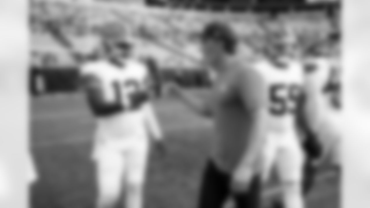 Quarterback Shedeur Sanders (12) and Head Coach Kevin Stefanski before a preseason NFL football game between the Cleveland Browns and Carolina Panthers on August 8, 2025 at Bank of America Stadium. The Browns won 30-10.