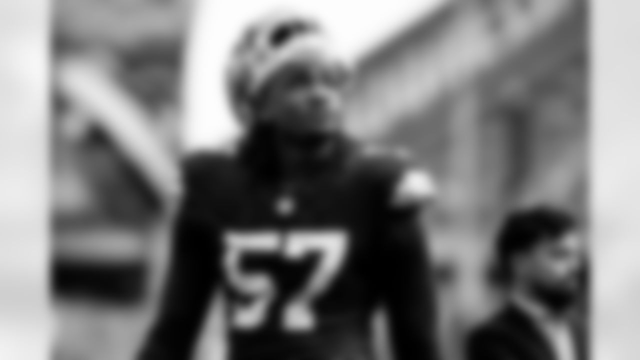Defensive end Isaiah McGuire (57)