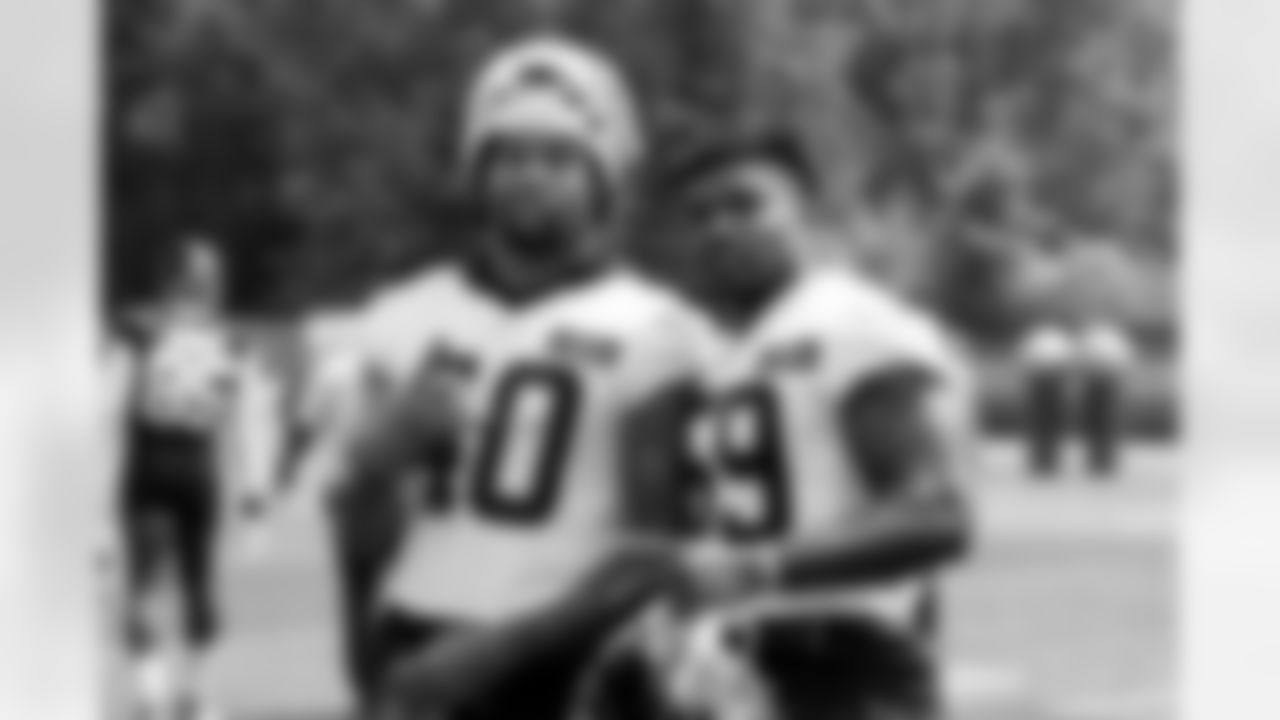 Linebacker Nathaniel Watson (40) and Linebacker Winston Reid (59) during the third day of mandatory minicamp at CrossCountry Mortgage Campus on June 12, 2025.