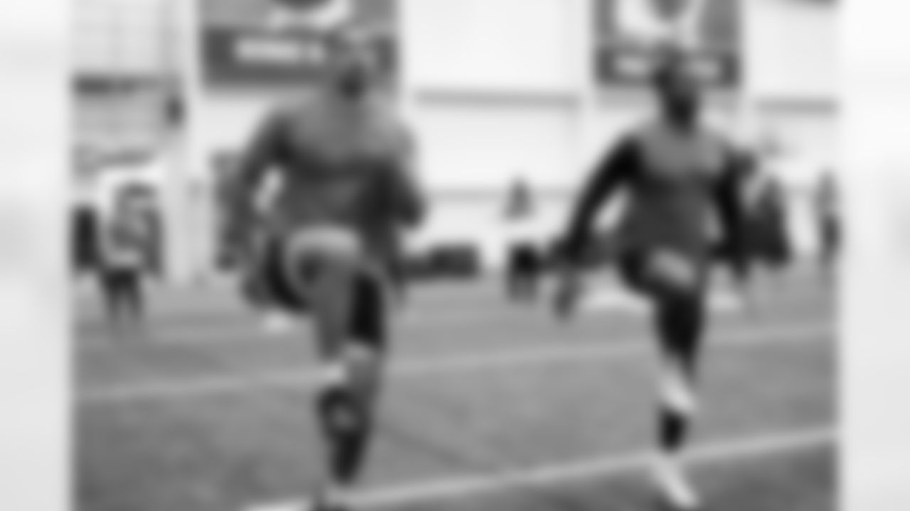 Defensive end Elerson G. Smith (52) during a workout in Phase I of the offseason at CrossCountry Mortgage Campus on April 29, 2025.