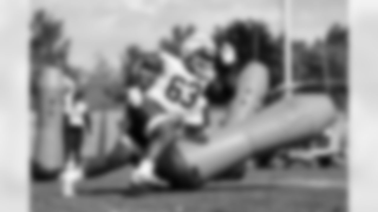 Defensive tackle Ralph Holley (63)