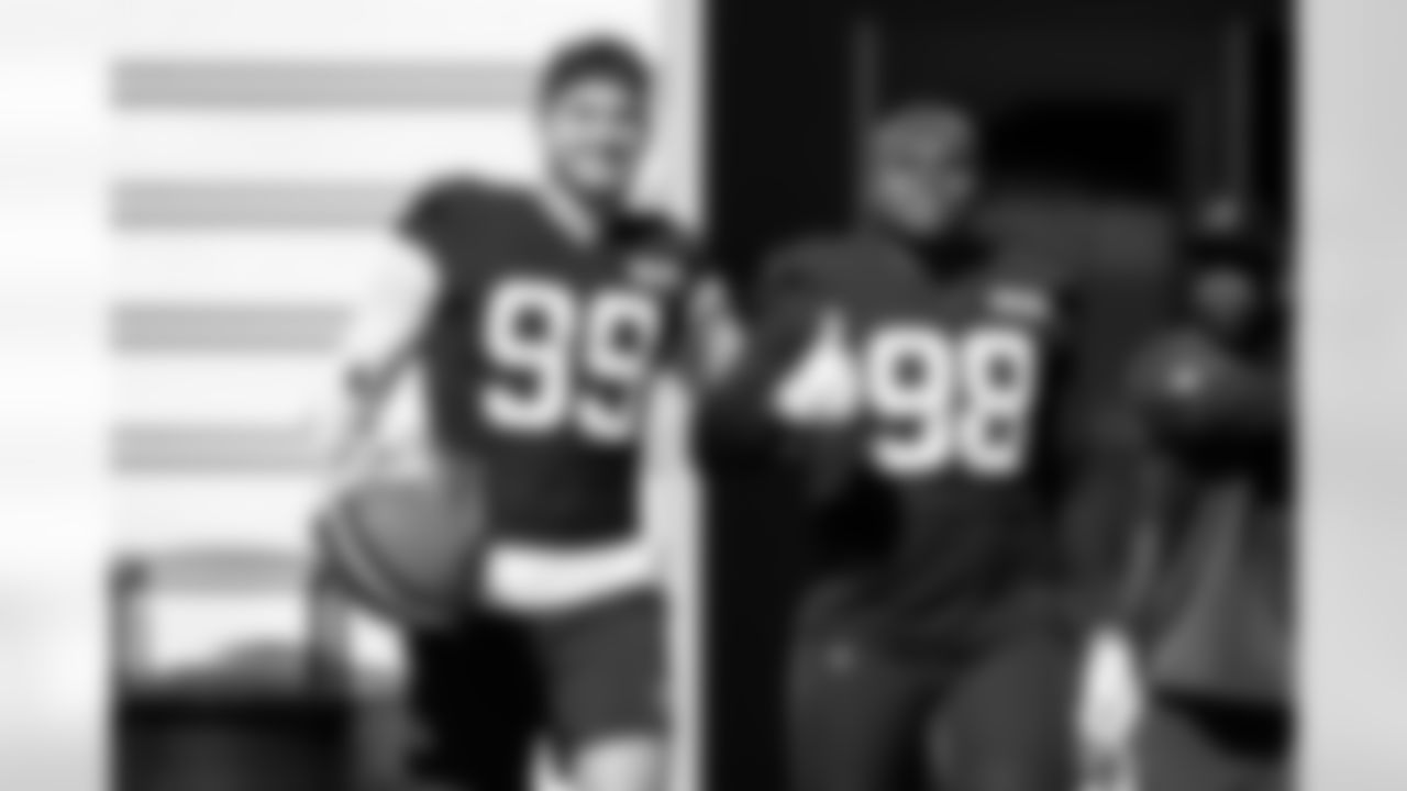 Defensive end Cameron Thomas (99) and Defensive lineman Adin Huntington (98) during practice at CrossCountry Mortgage Campus on October 9, 2025.