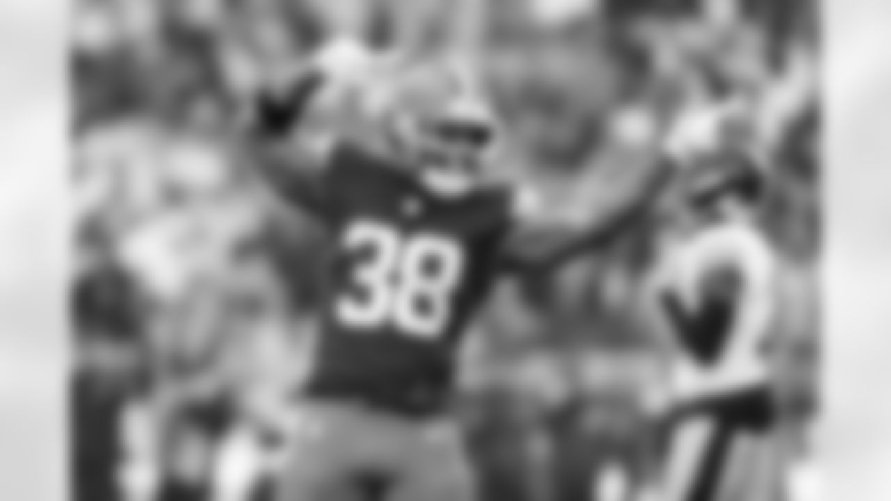 Running back Trayveon Williams (38)