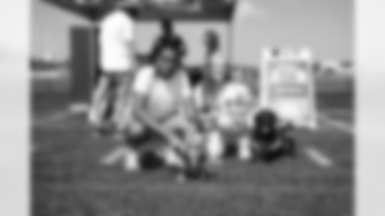The 2025 Turf & Tails Barking Backers event at CrossCountry Mortgage Campus on June 22, 2025.
