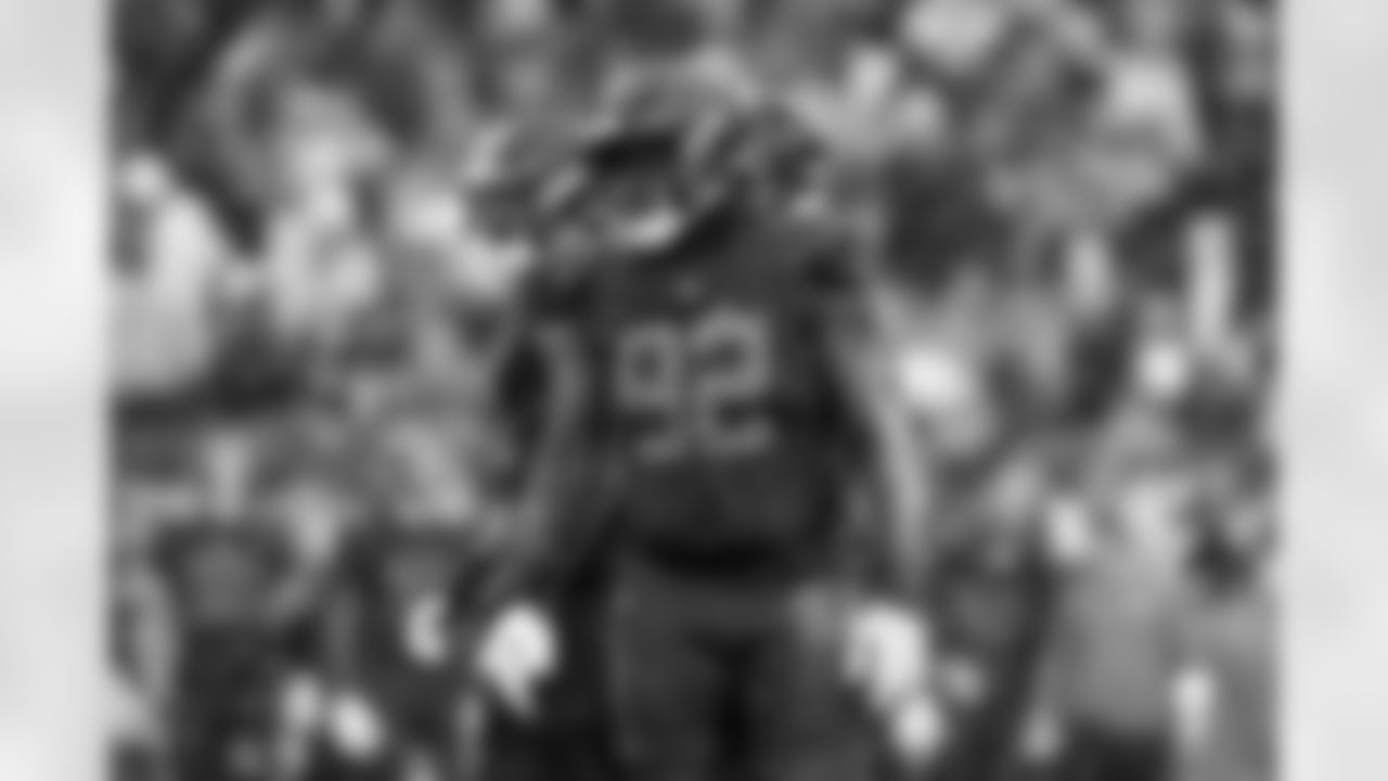 Defensive end Sam Kamara (92)