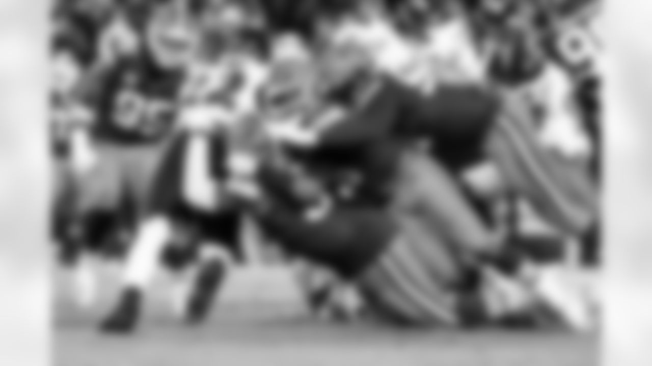 Defensive tackle Shelby Harris (93), Linebacker Devin Bush (30) and Defensive end Isaiah McGuire (57) during a NFL football game between the Baltimore Ravens and Cleveland Browns on November 16, 2025 at Huntington Bank Field. The Browns lost 16-23.