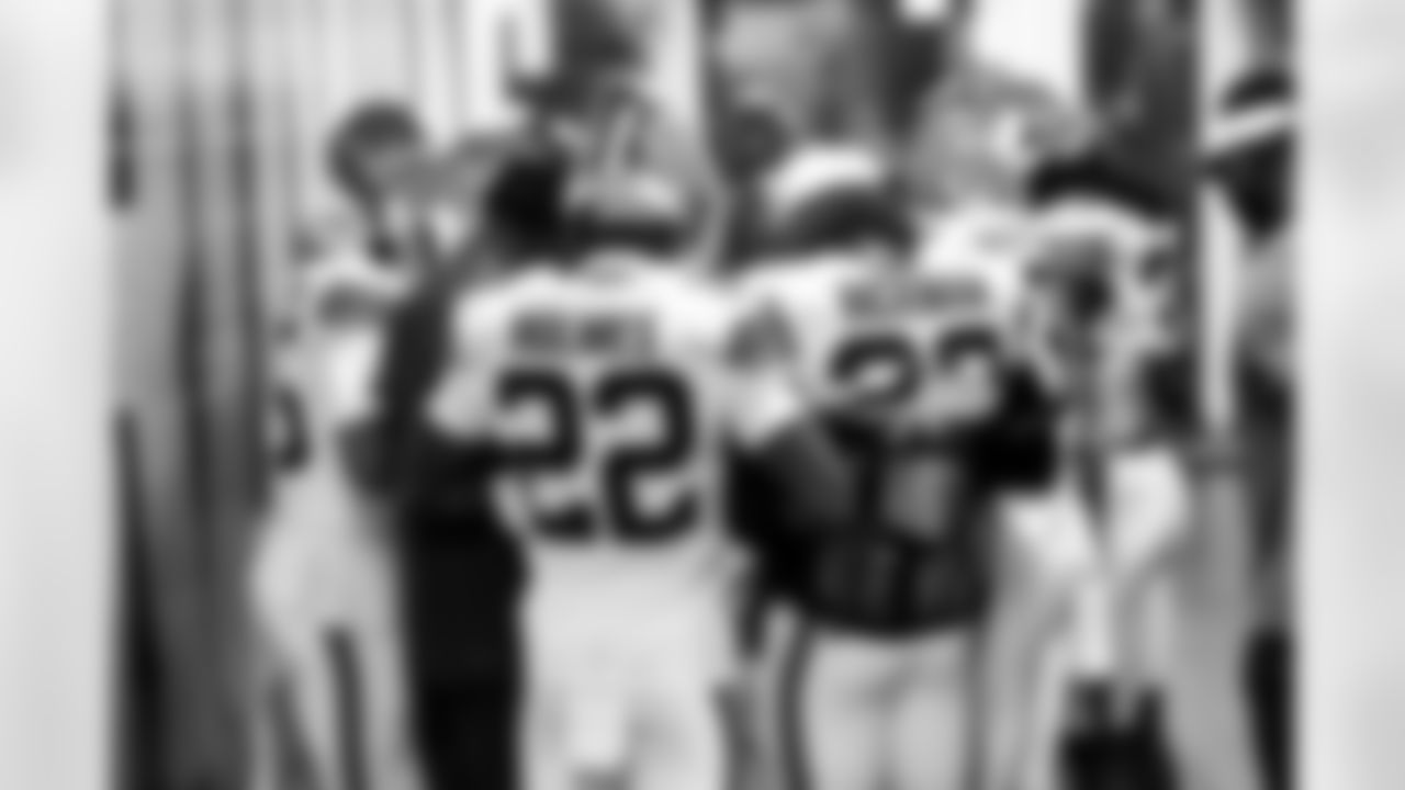 Cornerback Christian Holmes (22) and Safety Ronnie Hickman Jr. (33) before a preseason NFL football game between the Los Angeles Rams and Cleveland Browns on August 23, 2025 at Huntington Bank Field.
