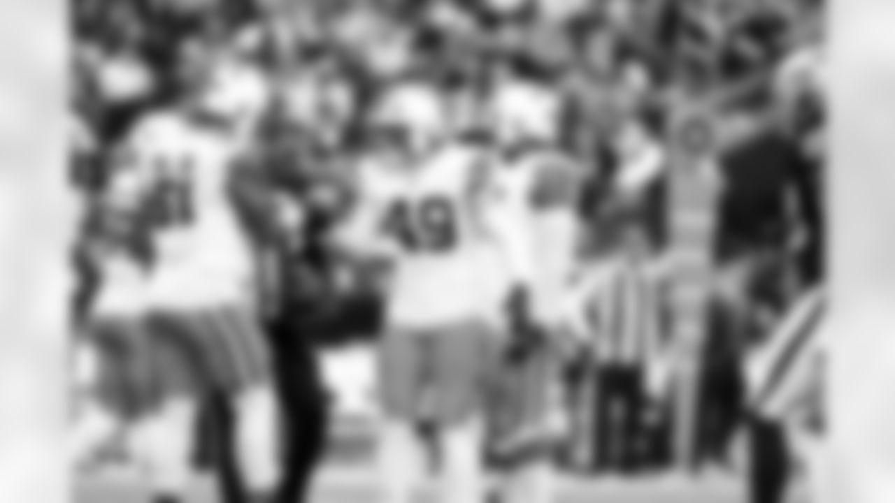 Defensive tackle Mike Hall Jr. (51) and `other Linebacker Carson Schwesinger (49) during a NFL football game between the Cleveland Browns and Las Vegas Raiders on November 23, 2025 at Allegiant Stadium.