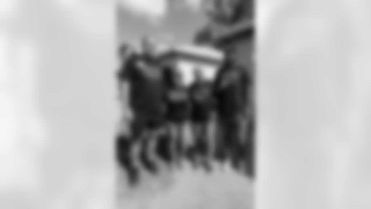 TAMPA, FL - November 18, 2025 - Offensive Lineman Lorenz Metz #71 and Tight End Devin Culp #82 of the Tampa Bay Buccaneers during a home build with Habitat for Humanity of Tampa Bay Hillsborough. Photo By Doug DeFelice/Tampa Bay Buccaneers