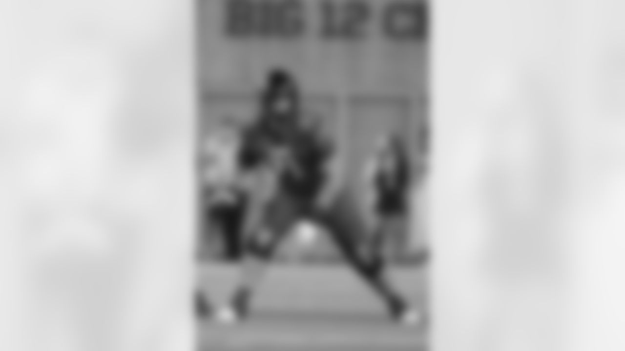 Utah offensive lineman Caleb Lomu blocks against Baylor during the first half of an NCAA college football game Saturday, Nov. 15, 2025, in Waco, Texas. (AP Photo/Julio Cortez)