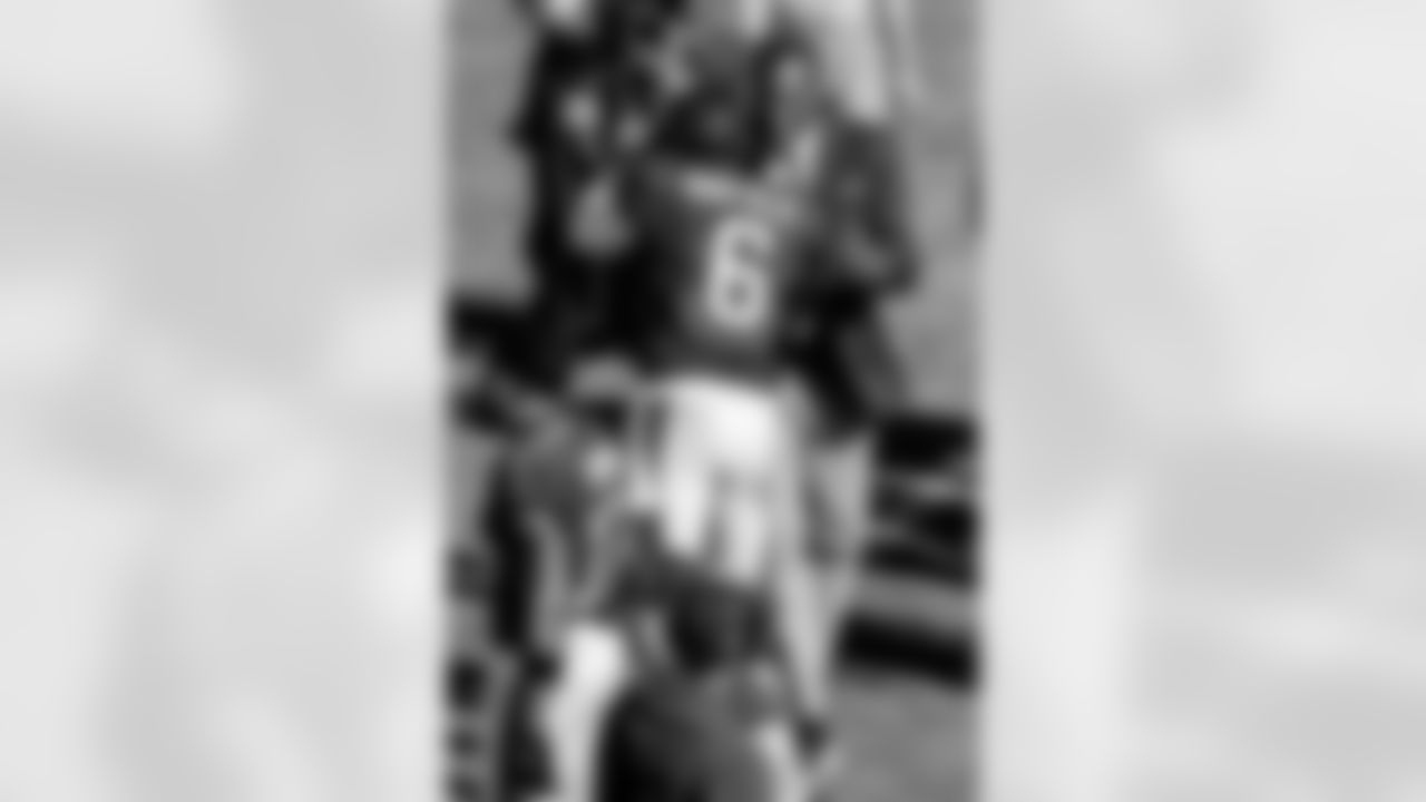 TAMPA, FL - November 30, 2025 - Quarterback Baker Mayfield #6 of the Tampa Bay Buccaneers and Buccaneers Legend Simeon Rice at halftime during the game between the Arizona Cardinals and Tampa Bay Buccaneers. The Bucs won the game, 20-17. Photo By Dave Pullis/Tampa Bay Buccaneers