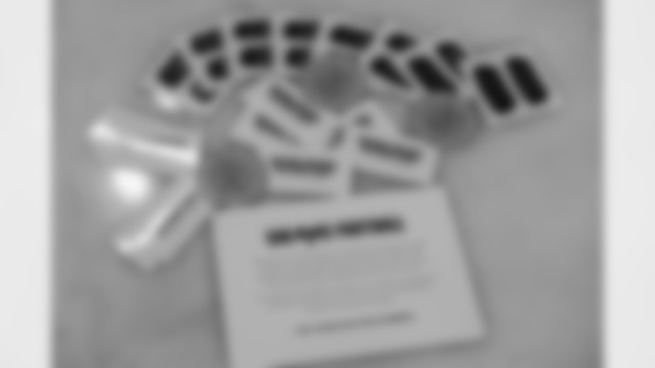 TAMPA, FL - December 06, 2025 - Set up for the She is Football Bayshore Walk: Raise The Flags event with Bayshore Breakfast Club and Tampa Girls Social & Wellness at Hyde House Public Studio. Photo By Mike Carlson/Tampa Bay Buccaneers