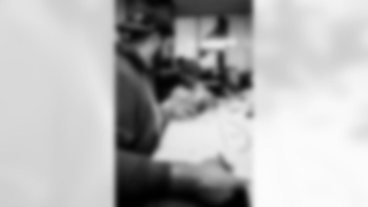 TAMPA, FL - November 19, 2025 - Guard Ben Bredeson #68 of the Tampa Bay Buccaneers during a visit with Triumph Together Cancer Warriors. Photo By Kyle Zedaker/Tampa Bay Buccaneers