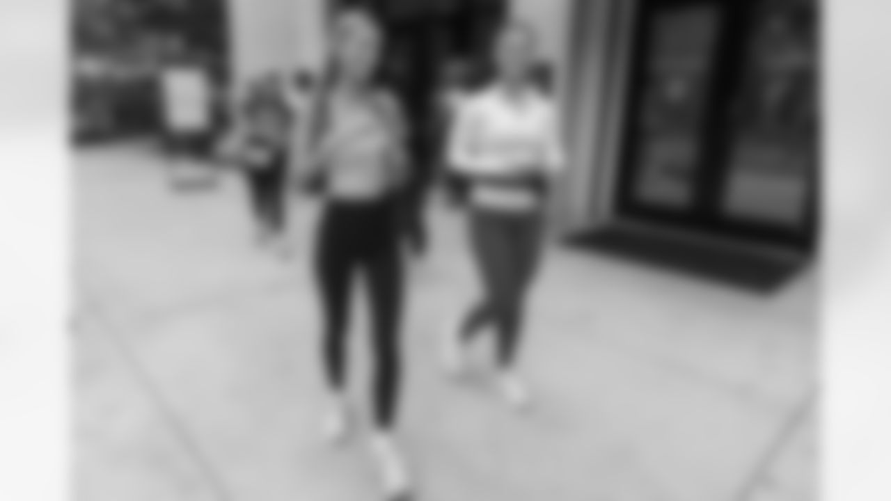 TAMPA, FL - December 06, 2025 - She is Football Bayshore Walk: Raise The Flags event with Bayshore Breakfast Club and Tampa Girls Social & Wellness at Hyde House Public Studio. Photo By Mike Carlson/Tampa Bay Buccaneers