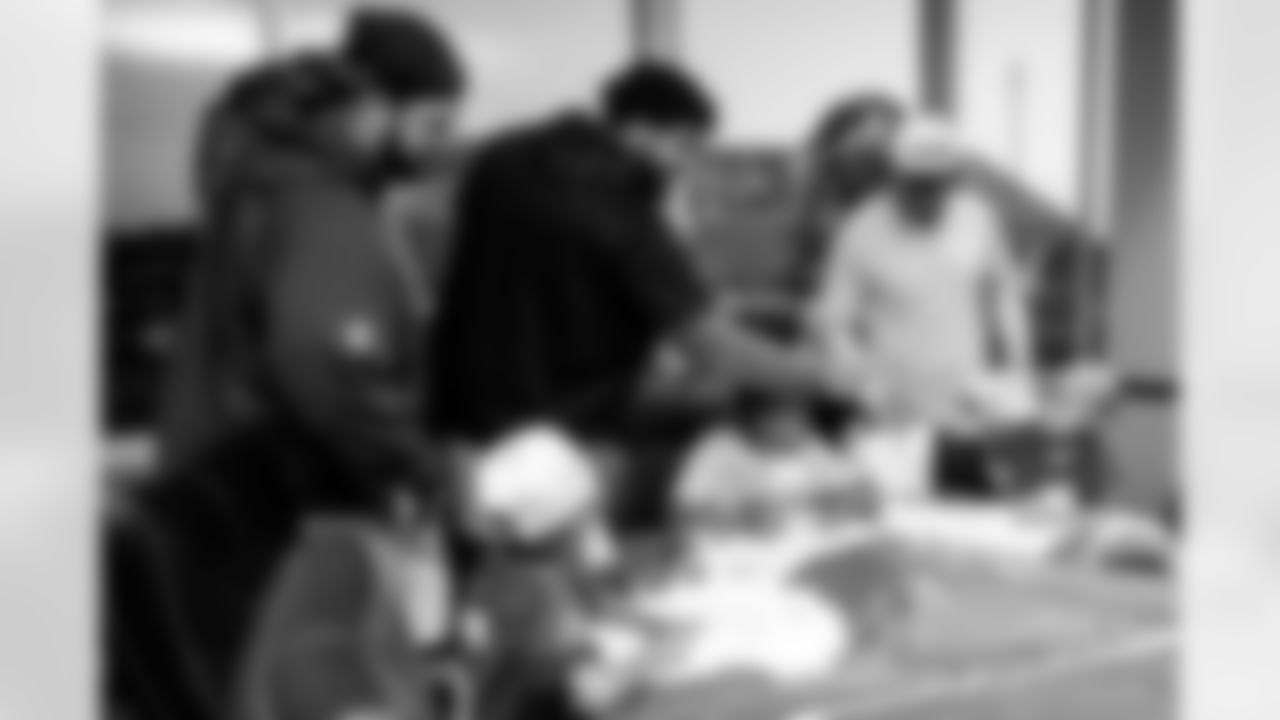 TAMPA, FL - November 19, 2025 - Guard Ben Bredeson #68, Tackle Tristan Wirfs #78, and Quarterback Baker Mayfield #6 of the Tampa Bay Buccaneers during a visit with Triumph Together Cancer Warriors. Photo By Kyle Zedaker/Tampa Bay Buccaneers