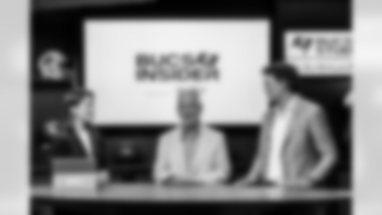 TAMPA, FL - January 27, 2026 - Offensive Coordinator Zac Robinson of the Tampa Bay Buccaneers films Bucs Insider with Team Reporter Casey Phillips and Senior Writer Scott Smith after his introductory press conference at AdventHealth Training Center. Photo By Tori Richman/Tampa Bay Buccaneers