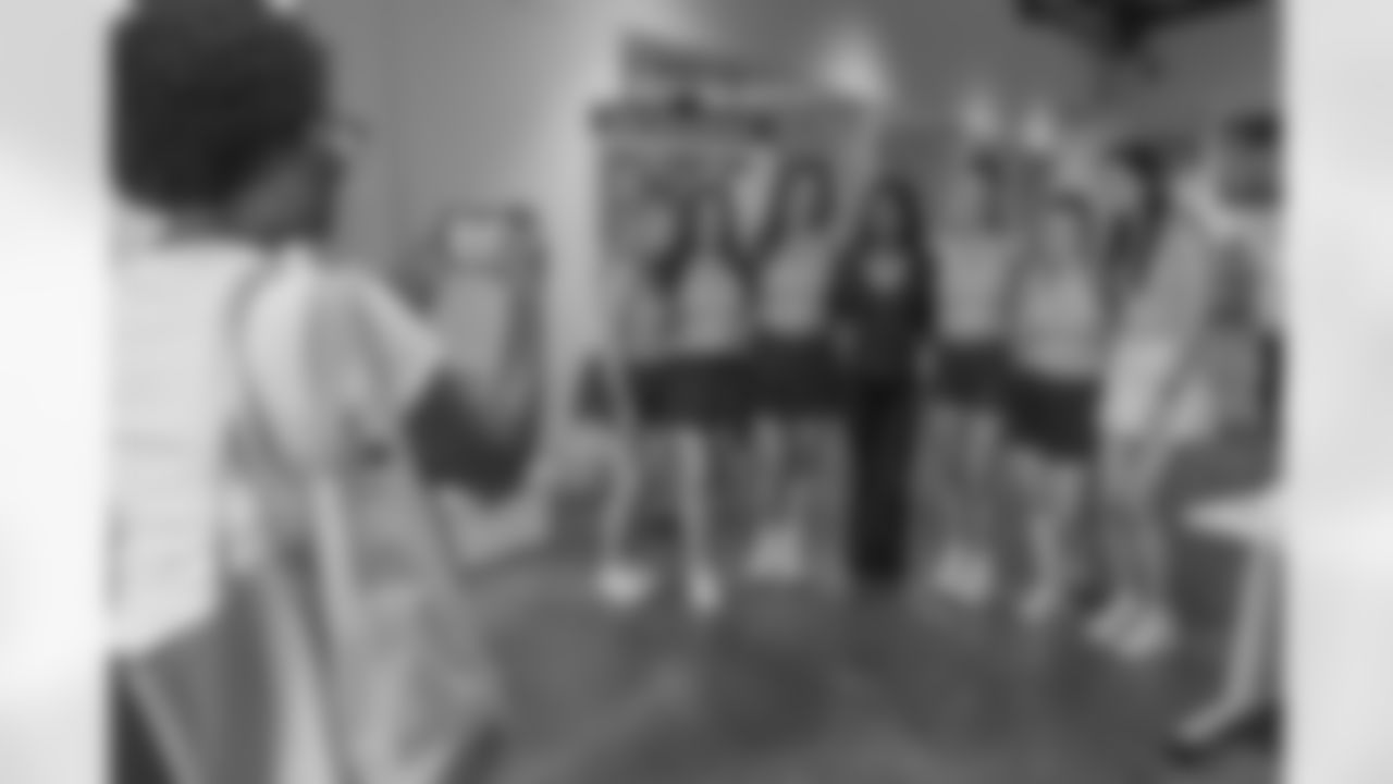 TAMPA, FL - December 06, 2025 - She is Football Bayshore Walk: Raise The Flags event with Bayshore Breakfast Club and Tampa Girls Social & Wellness at Hyde House Public Studio. Photo By Mike Carlson/Tampa Bay Buccaneers