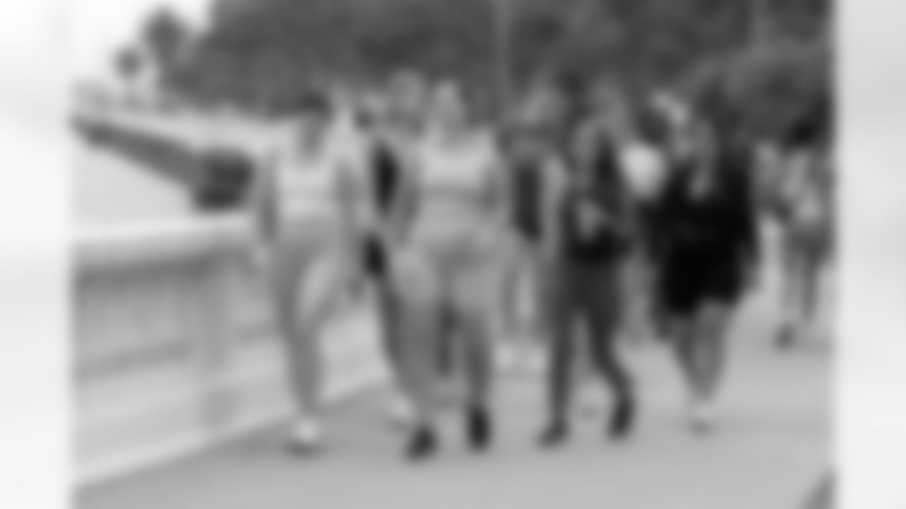 TAMPA, FL - December 06, 2025 - She is Football Bayshore Walk: Raise The Flags event with Bayshore Breakfast Club and Tampa Girls Social & Wellness at Hyde House Public Studio. Photo By Mike Carlson/Tampa Bay Buccaneers