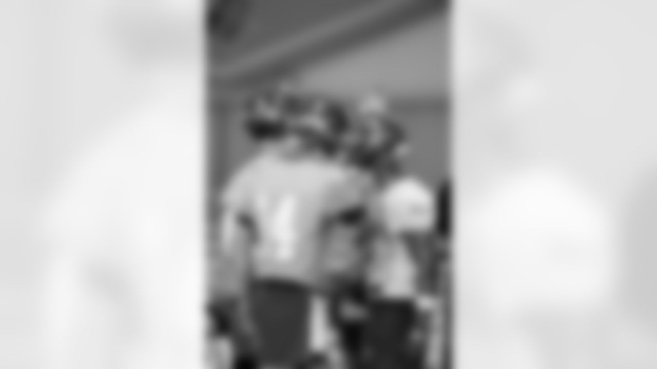 TAMPA, FL - May 10, 2025 - Quarterback Connor Bazelak #8, Quarterback Connor Watkins #14, and Wide Receiver Emeka Egbuka #9 of the Tampa Bay Buccaneers during rookie minicamp practice. Photo By Kyle Zedaker/Tampa Bay Buccaneers