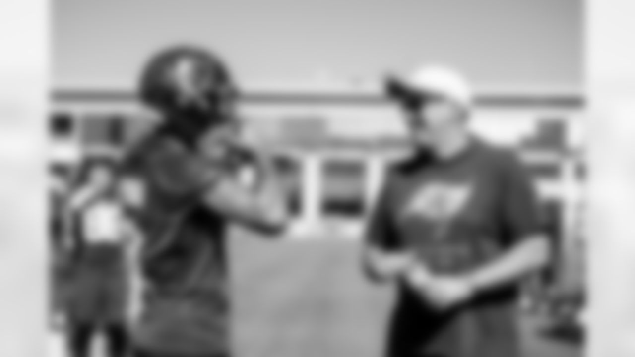 TAMPA, FL - November 20, 2025 - Wide Receiver Emeka Egbuka #2 of the Tampa Bay Buccaneers and General Manager Jason Licht during practice at AdventHealth Training Center. Photo By Tori Richman/Tampa Bay Buccaneers