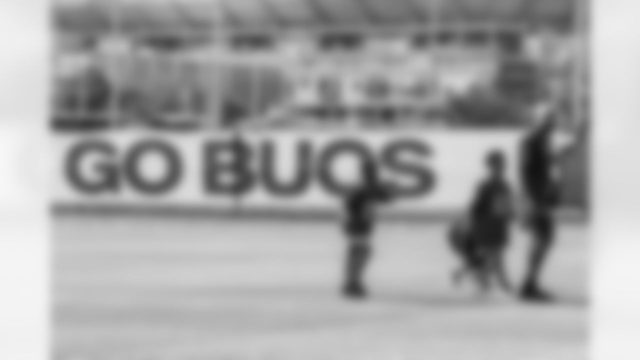 TAMPA, FL - December 05, 2025 - Mike and Ashli Evans host the Mike Evans Family Foundation 'Catch for Christmas' holiday event at AdventHealth Training Center. Photo By Kyle Zedaker/Tampa Bay Buccaneers