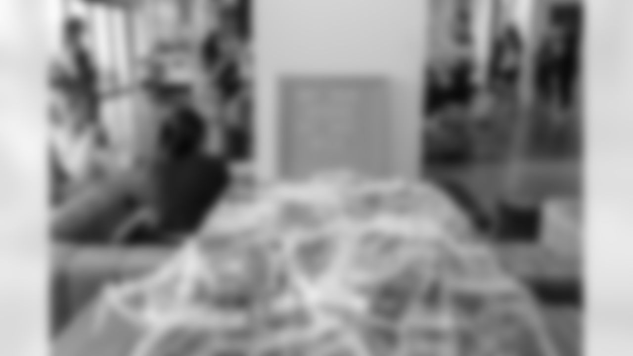 TAMPA, FL - December 06, 2025 - She is Football Bayshore Walk: Raise The Flags event with Bayshore Breakfast Club and Tampa Girls Social & Wellness at Hyde House Public Studio. Photo By Mike Carlson/Tampa Bay Buccaneers