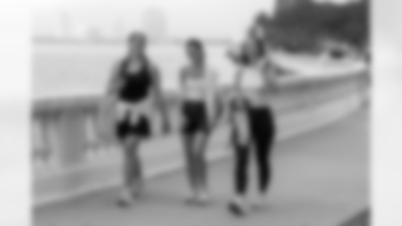 TAMPA, FL - December 06, 2025 - She is Football Bayshore Walk: Raise The Flags event with Bayshore Breakfast Club and Tampa Girls Social & Wellness at Hyde House Public Studio. Photo By Mike Carlson/Tampa Bay Buccaneers