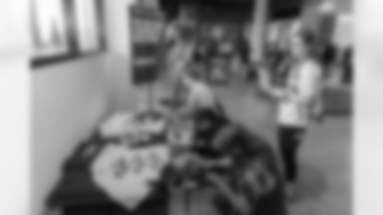 TAMPA, FL - December 06, 2025 - She is Football Bayshore Walk: Raise The Flags event with Bayshore Breakfast Club and Tampa Girls Social & Wellness at Hyde House Public Studio. Photo By Mike Carlson/Tampa Bay Buccaneers