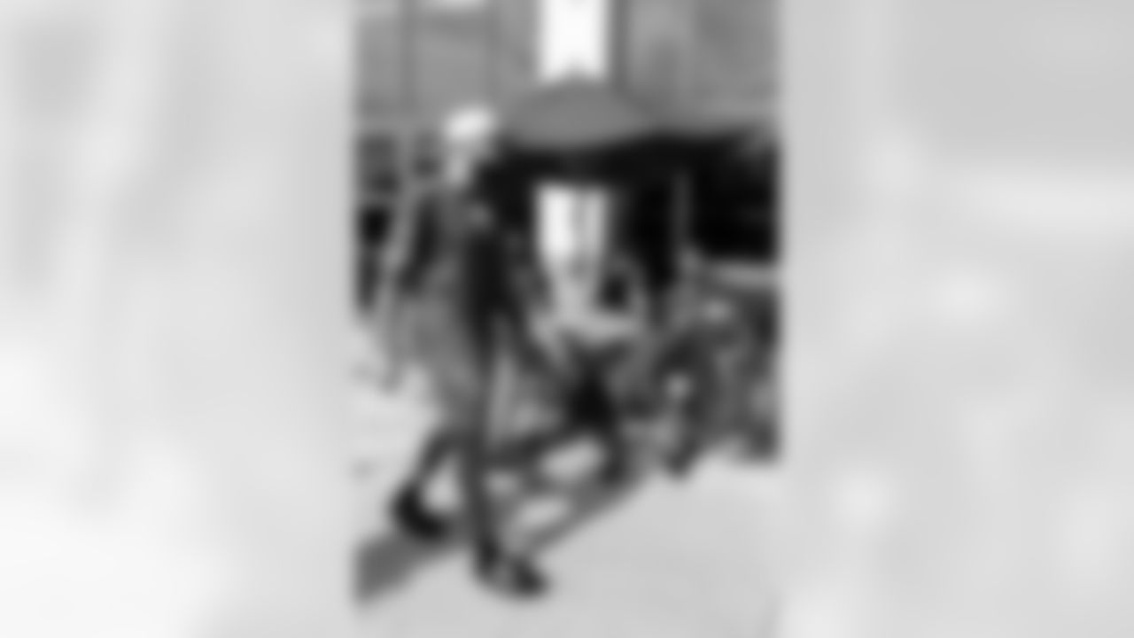 TAMPA, FL - December 05, 2025 - Mike and Ashli Evans host the Mike Evans Family Foundation 'Catch for Christmas' holiday event at AdventHealth Training Center. Photo By Kyle Zedaker/Tampa Bay Buccaneers