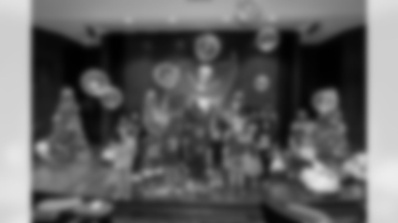 TAMPA, FL - December 05, 2025 - Mike and Ashli Evans host the Mike Evans Family Foundation 'Catch for Christmas' holiday event at AdventHealth Training Center. Photo By Kyle Zedaker/Tampa Bay Buccaneers