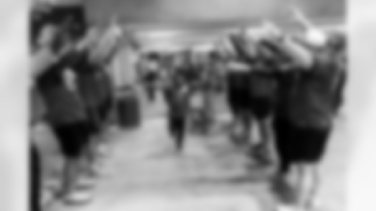 TAMPA, FL - December 15, 2025 - The Tampa Bay Buccaneers offensive line hosts the annual 'O-Line Lights Up Christmas' event providing holiday shopping sprees for local children. Photo By Kyle Zedaker/Tampa Bay Buccaneers