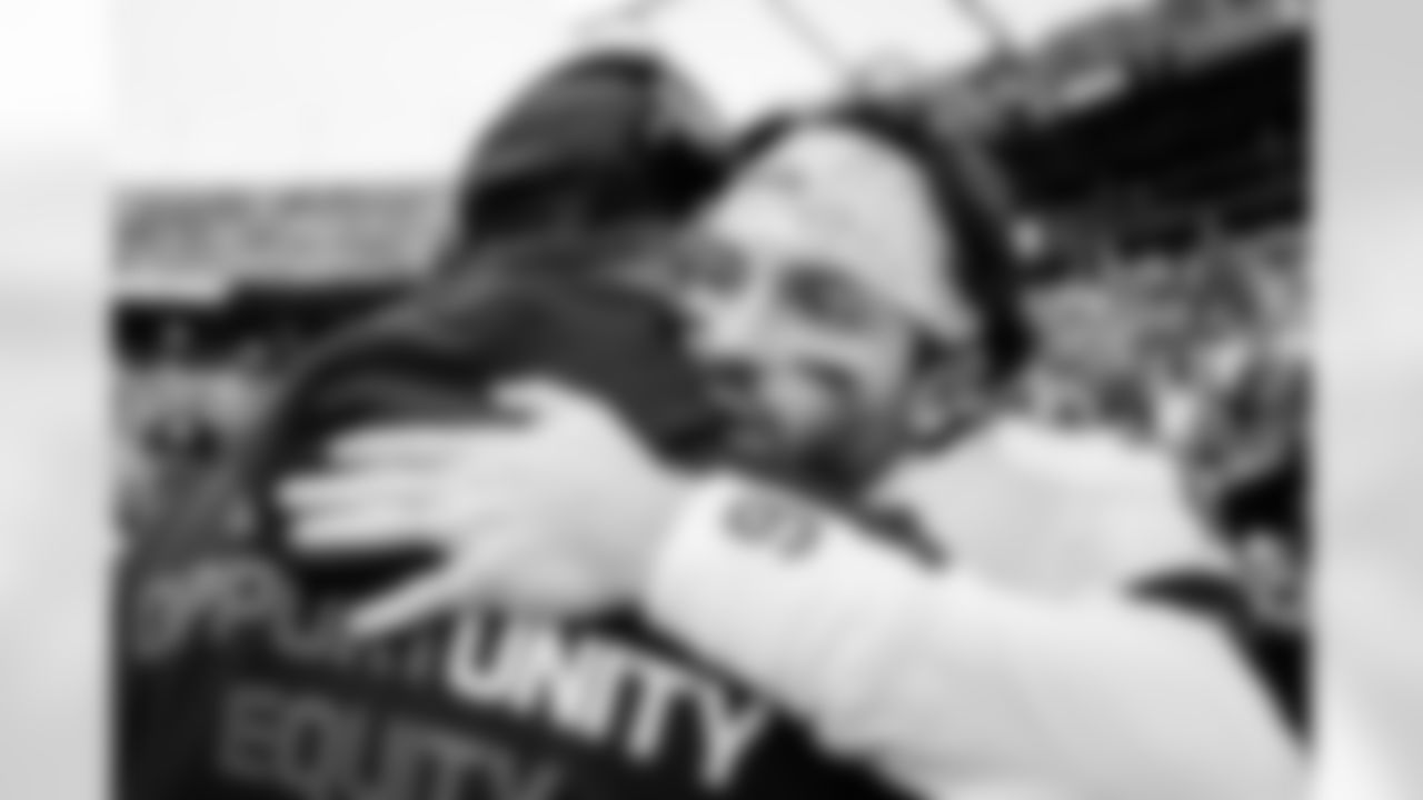 CHARLOTTE, NC - December 21, 2025 - Offensive Coordinator Josh Grizzard and Quarterback Baker Mayfield #6 of the Tampa Bay Buccaneers before the game between the Tampa Bay Buccaneers and Carolina Panthers. The Bucs lost the game, 23-20. Photo By Kyle Zedaker/Tampa Bay Buccaneers