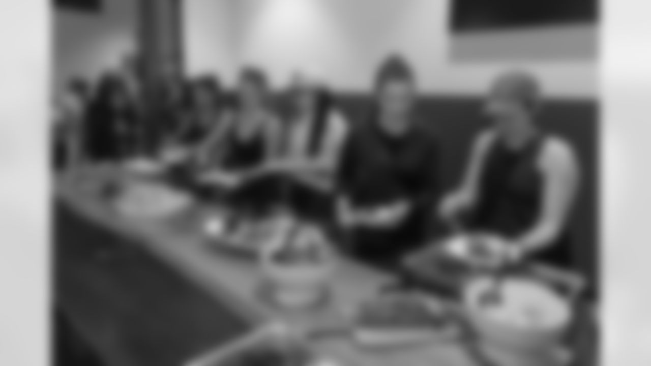 TAMPA, FL - December 06, 2025 - She is Football Bayshore Walk: Raise The Flags event with Bayshore Breakfast Club and Tampa Girls Social & Wellness at Hyde House Public Studio. Photo By Mike Carlson/Tampa Bay Buccaneers