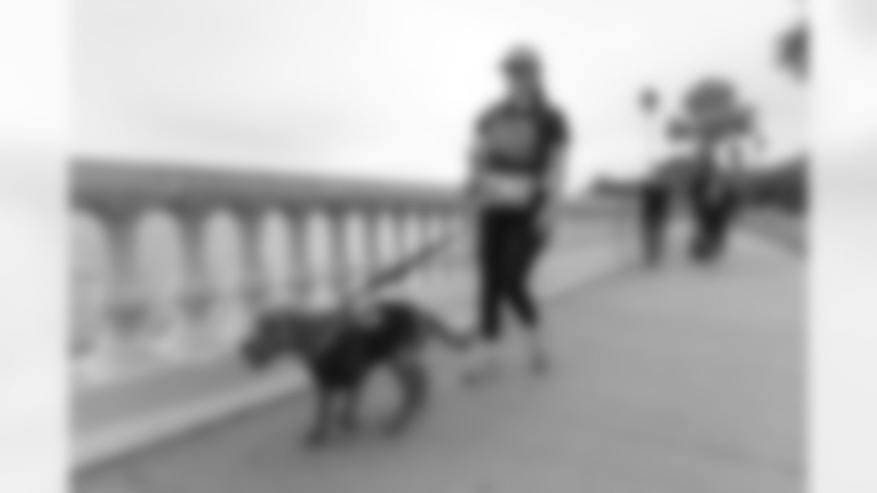 TAMPA, FL - December 06, 2025 - She is Football Bayshore Walk: Raise The Flags event with Bayshore Breakfast Club and Tampa Girls Social & Wellness at Hyde House Public Studio. Photo By Mike Carlson/Tampa Bay Buccaneers