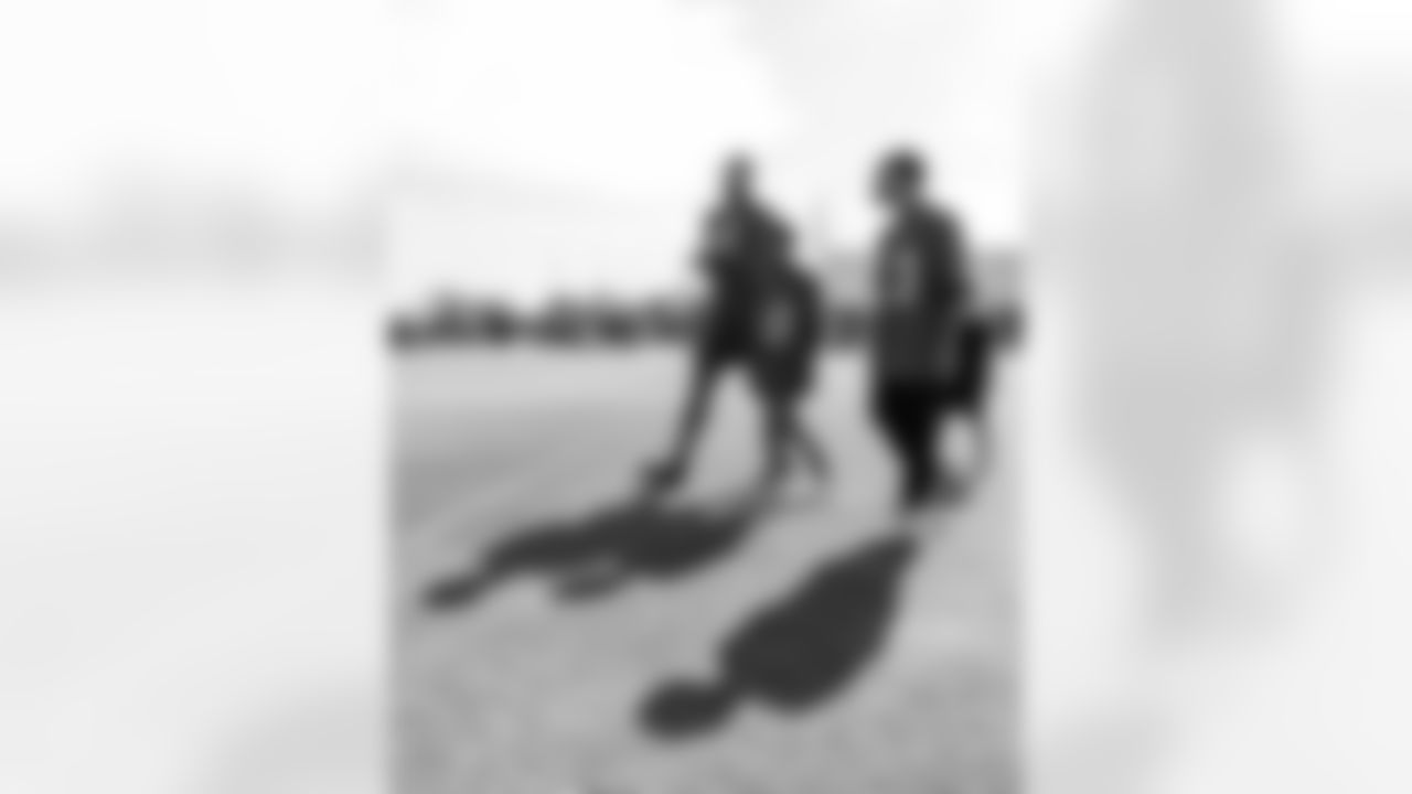 TAMPA, FL - December 05, 2025 - Mike and Ashli Evans host the Mike Evans Family Foundation 'Catch for Christmas' holiday event at AdventHealth Training Center. Photo By Kyle Zedaker/Tampa Bay Buccaneers