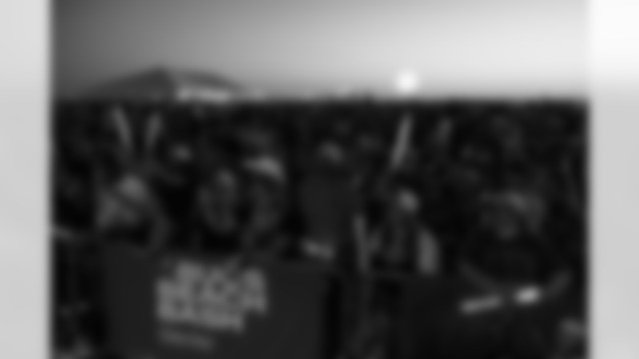 ST. PETE BEACH, FL - April 26, 2025 - The crowd watches LoCash perform at sunset during Bucs Beach Bash. Photo By Dave Pullis/Tampa Bay Buccaneers