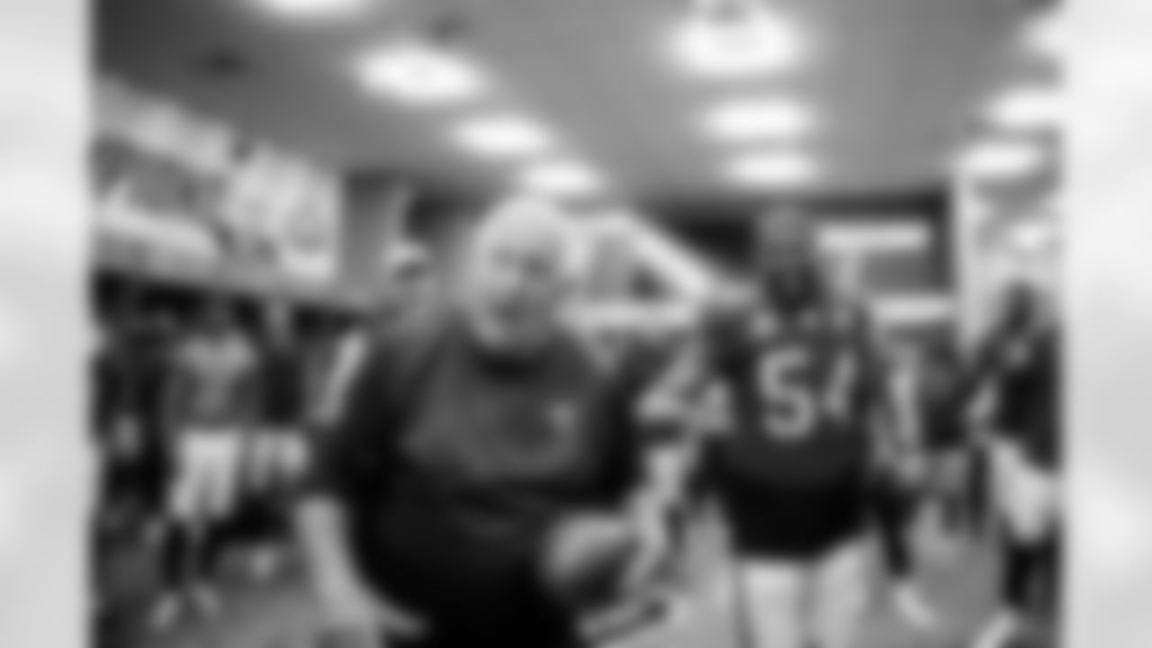 TAMPA, FL - November 30, 2025 - Senior Offensive Assistant Tom Moore and Inside Linebacker Lavonte David #54 of the Tampa Bay Buccaneers after the game between the Arizona Cardinals and Tampa Bay Buccaneers. The Bucs won the game, 20-17. Photo By Tori Richman/Tampa Bay Buccaneers