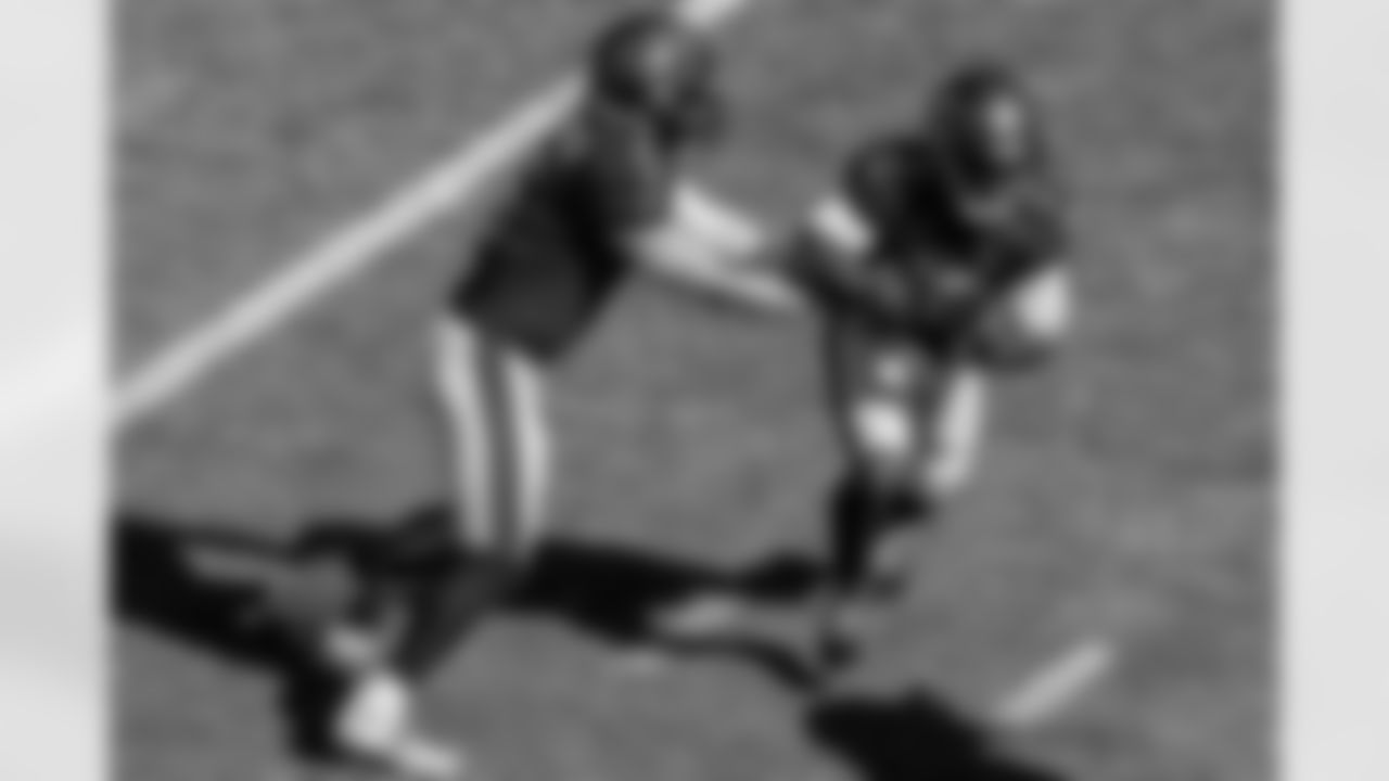 TAMPA, FL - November 30, 2025 - Quarterback Baker Mayfield #6 and Running Back Bucky Irving #7 of the Tampa Bay Buccaneers during the game between the Arizona Cardinals and Tampa Bay Buccaneers. The Bucs won the game, 20-17. Photo By Mike Carlson/Tampa Bay Buccaneers