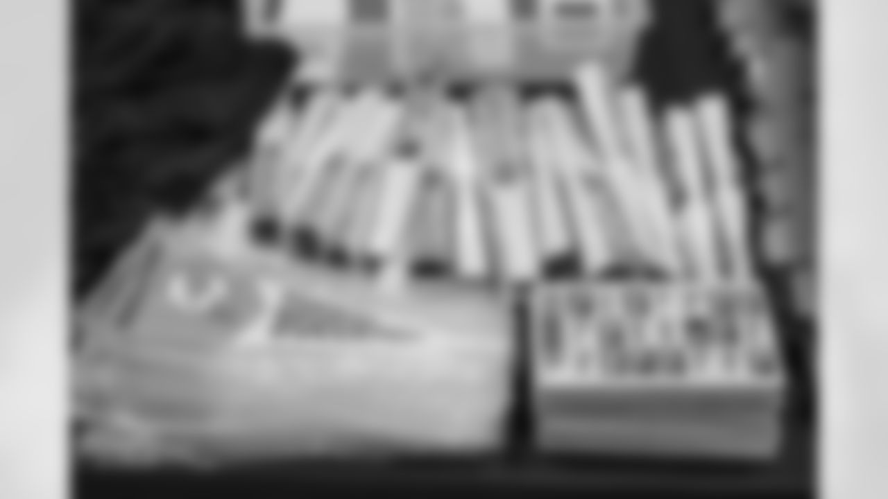 TAMPA, FL - December 06, 2025 - Set up for the She is Football Bayshore Walk: Raise The Flags event with Bayshore Breakfast Club and Tampa Girls Social & Wellness at Hyde House Public Studio. Photo By Mike Carlson/Tampa Bay Buccaneers