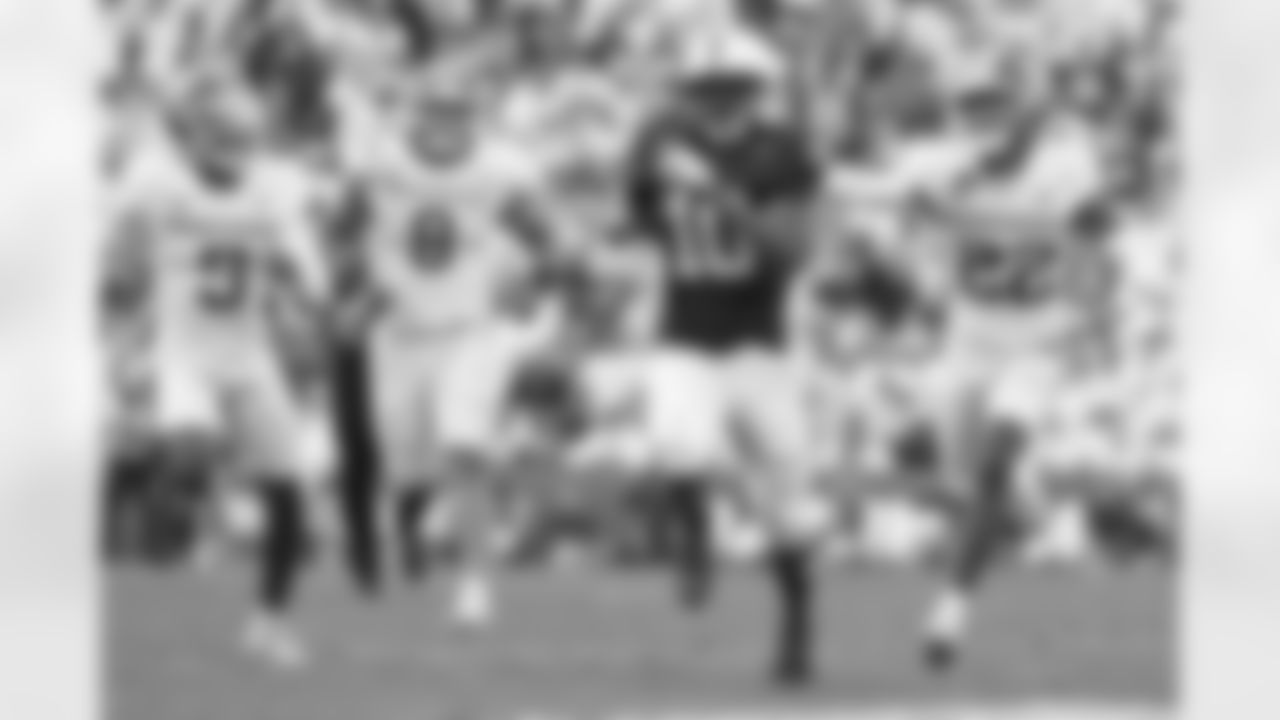 Penn State running back Nicholas Singleton (10) runs away from Indiana defenders D'Angelo Ponds (5),Stephen Daley (8) and Jamari Sharpe (22) during the 1st half of an NCAA college football game, Saturday, Nov. 8, 2025, in State College, Pa. (AP Photo/Barry Reeger)