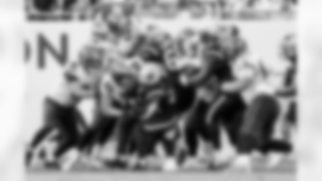 TAMPA, FL - November 09, 2025 - Inside Linebacker SirVocea Dennis #8, Outside Linebacker Anthony Nelson #98 and Defensive Lineman Logan Hall #90 of the Tampa Bay Buccaneers during the game between the New England Patriots and Tampa Bay Buccaneers. The Bucs lost the game, 28-23. Photo By Tori Richman/Tampa Bay Buccaneers