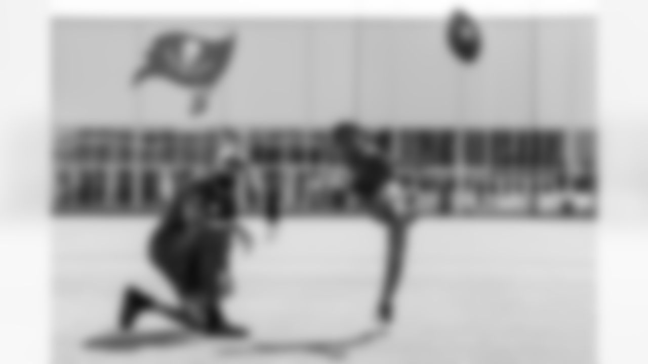 TAMPA, FL - December 05, 2025 - Mike and Ashli Evans host the Mike Evans Family Foundation 'Catch for Christmas' holiday event at AdventHealth Training Center. Photo By Kyle Zedaker/Tampa Bay Buccaneers