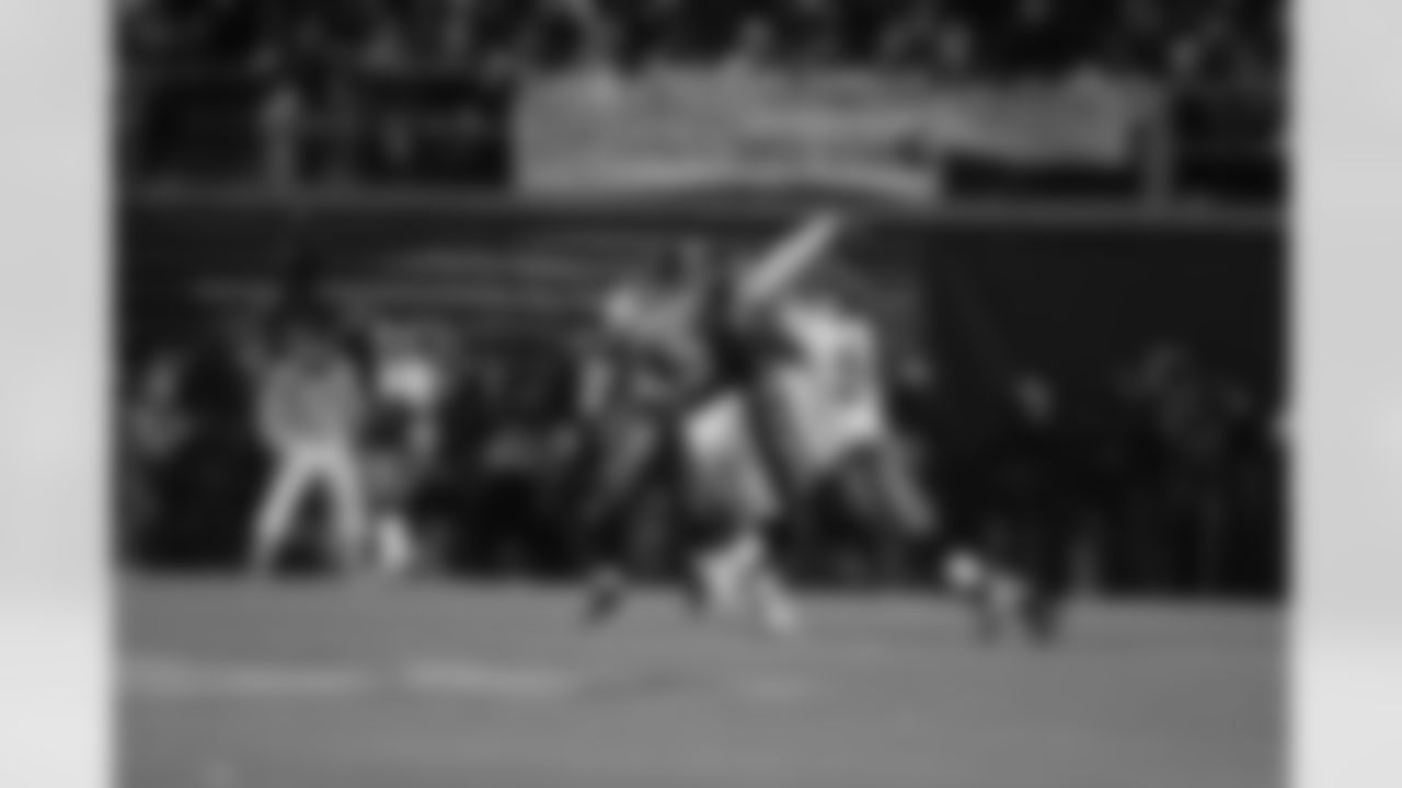 PHILADELPHIA, PA - JANUARY 19: Defensive end Greg Spires #94 of the Tampa Bay Buccaneers hits Quarterback Donovan McNabb #5 of the Philadelphia Eagles during the NFC Championship Game at Veterans Stadium on January 19, 2003 in Philadelphia, Pennsylvania. The Buccaneers won 27-10. (J Meric/Tampa Bay Buccaneers)