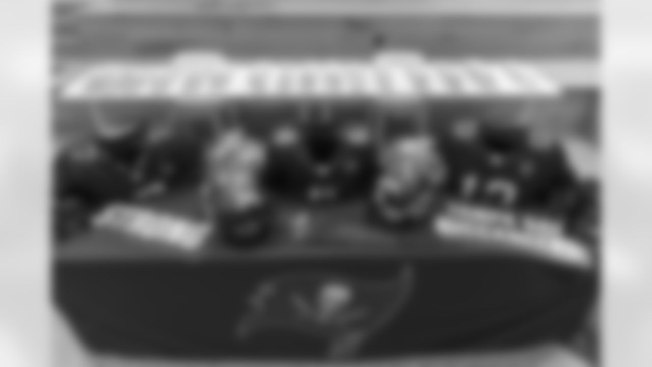 TAMPA, FL - December 06, 2025 - Set up for the She is Football Bayshore Walk: Raise The Flags event with Bayshore Breakfast Club and Tampa Girls Social & Wellness at Hyde House Public Studio. Photo By Mike Carlson/Tampa Bay Buccaneers